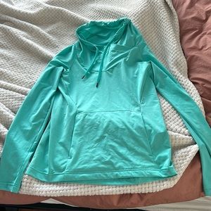 Teal Arc’Teryx Verana cowl neck base layer
